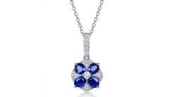Pendentif Solitaire Fleur Bleue. Or Blanc, Saphirs Et Diamants